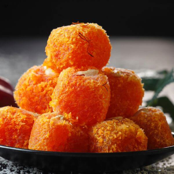 Top 10 Indian Desserts, Which are Most Popular and Loved by Indian Peoples 9 ladoo